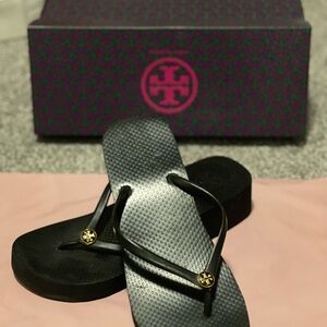 Tory Burch Black Platform Flip Flops with Gold Logo Medallions